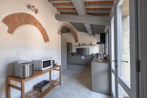 Wall, Interior Design, Furniture, Flooring, Kitchen, Ceiling, Countertop, Kitchen Appliance, Floor, Home