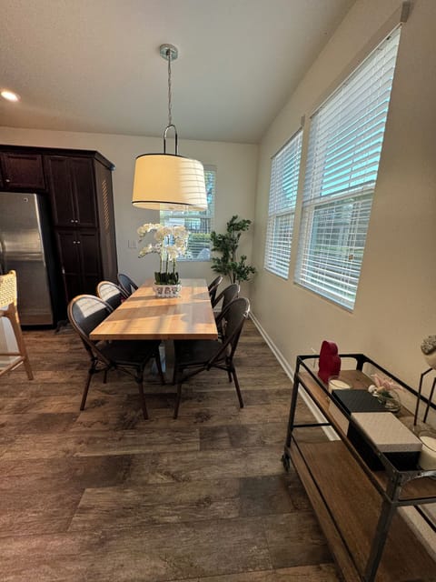 Dinning room table 6 chairs. 2 additional bar height chairs by kitchen Island.