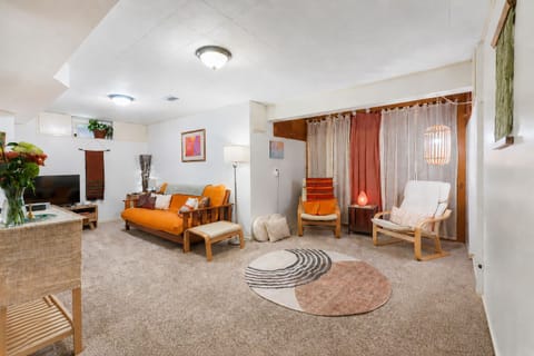 Open concept bohemian living room with sitting area