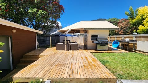 new large deck with bbq, outside furniture and utility