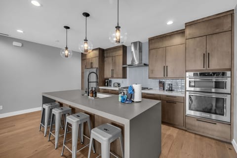 Kitchen with stainless steel appliances and counter