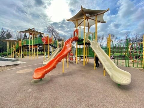 Let kids burn energy at a colorful playground close by.