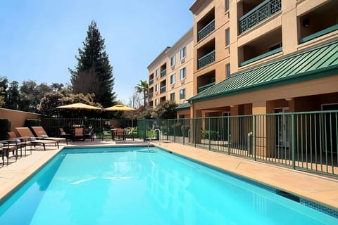 Soak up the sun beside the refreshing outdoor pool.