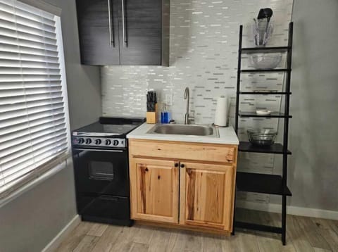 There is a new mini stove and oven in the kitchen so you can cook a delicious meal.

