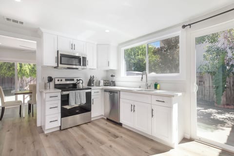 Fully upgraded kitchen with top of line appliances, utensils and cutlery