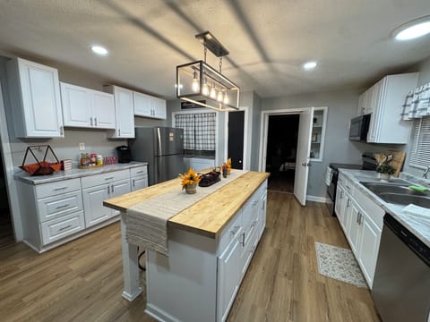 Fully equipped kitchen with island and seating.