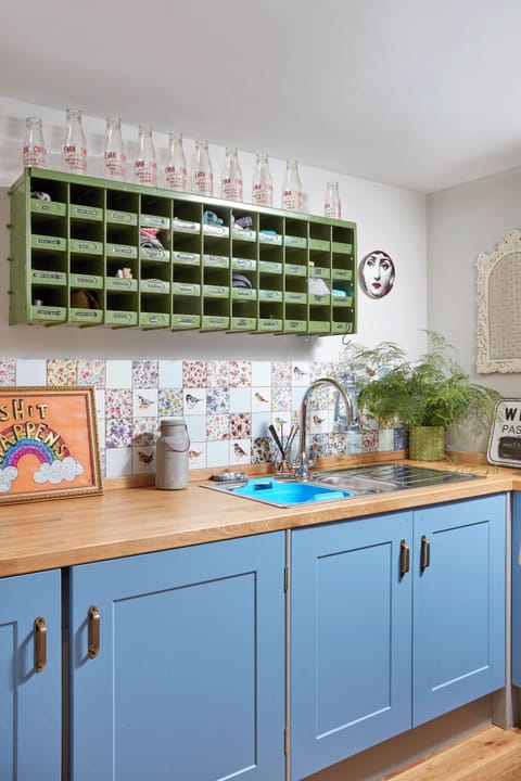 Utility Room with spares, washer, dryer and ironing equip