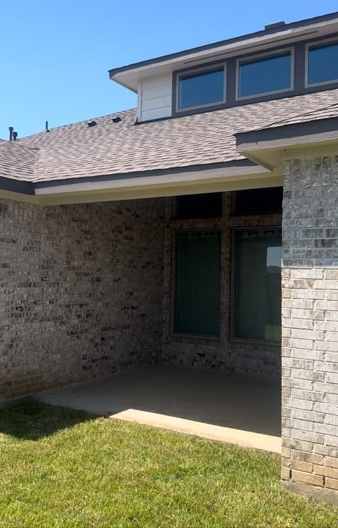 Backyard with covered patio