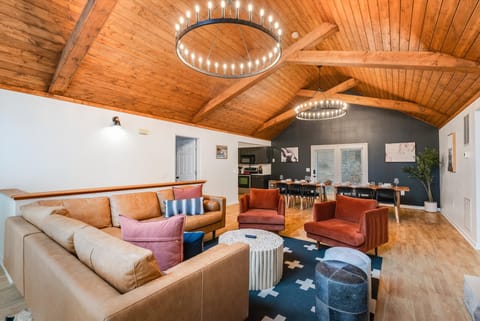 Step into this inviting home, where comfort and style meet. The gas fireplace creates a warm and cozy ambiance, perfect for relaxing after a day of adventures. The stylish furnishings throughout the home provide both elegance and comfort, while the open floor plan allows for easy flow between the living, dining, and kitchen areas—ideal for gatherings and entertaining