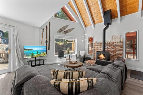 Living room with gas fire place and 50 inch smart TV