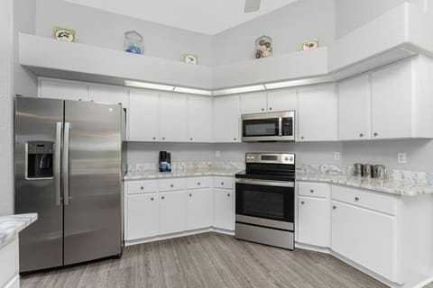 Beautiful White Kitchen with Coffee Maker