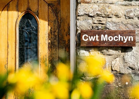 Wooden cottage name sign