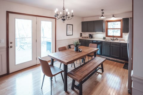 The heart of the Hideout: an open kitchen that flows to the forest deck.
