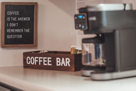 Your fully stocked coffee bar awaits with both Keurig and drip options.