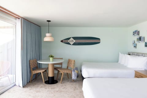 Unwind in a bright, airy room with surf-chic style