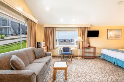 Stretch out on the sofa and savor the airy open layout.