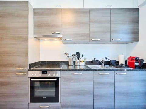 Cabinetry, Countertop, Furniture, Tap, Kitchen, Kitchen Stove, Building, Sink, Wood, Interior Design