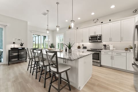 Island w/ bar seating is perfect for entertaining