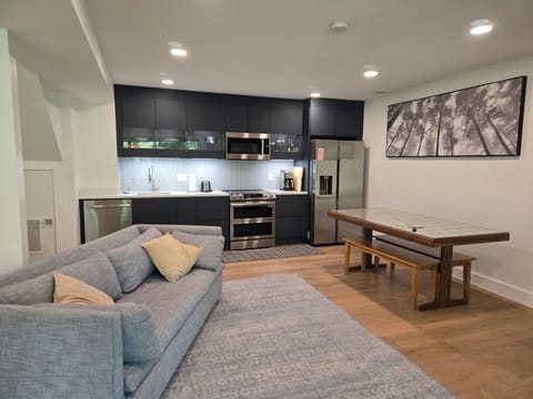 Full kitchen with high-end appliances and custom German cabinets.  