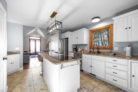 Kitchen is outfitted with an Induction Cooktop