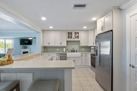 Large kitchen with island with seating