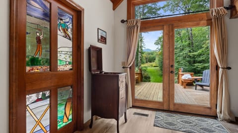 Original stained glass and doors to deck