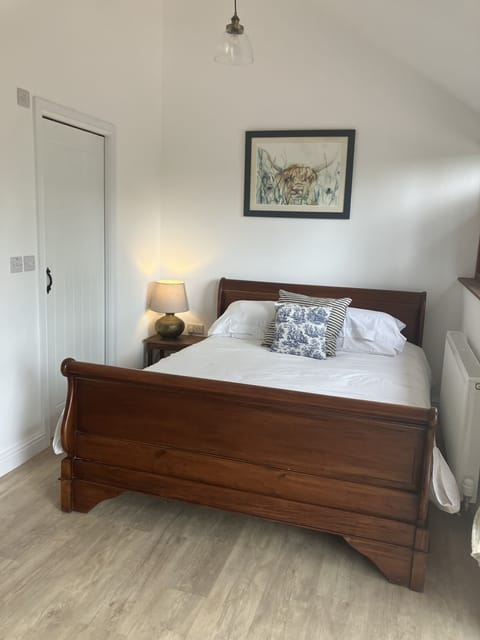 Beautiful white Linen in a King size sleigh bed