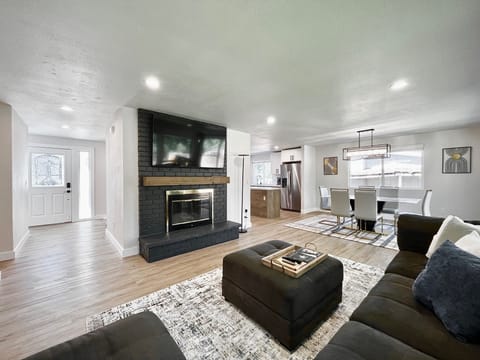 This space is ideal for reading, watching the 65" TV, or playing games.