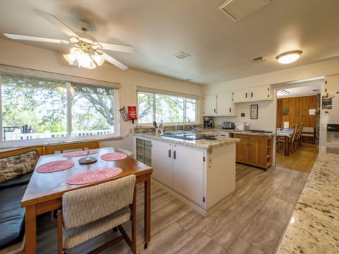 Kitchen seating area, stove, with necessities and comforts to cook and bake!