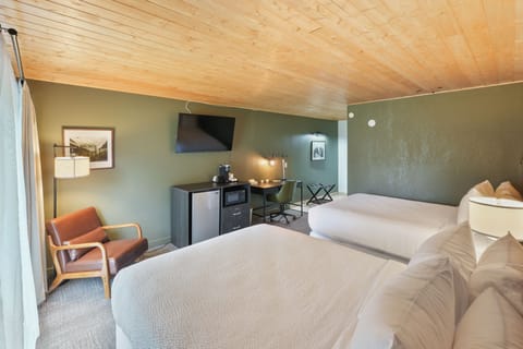 Perfect for families or friends, this stylishly updated space features two plush queen beds and modern amenities for a relaxing stay. Enjoy the comfort and convenience of a beautifully refreshed room. Book your mountain retreat now!
