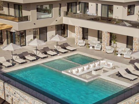 The outdoor pool area is perfect for family fun.