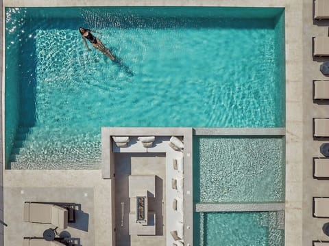 Tranquility unfolds at the 70m² pool area.
