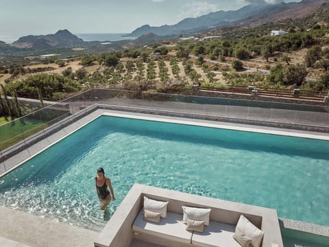 Relax on the stylish pool terrace, where the heated pool.
