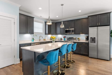 Sip morning coffee or grab a bite at the kitchen counter, with seating for 4