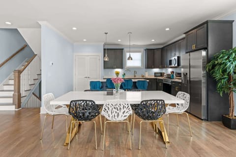 Gather for meals together at the elegant dining table, seating 8