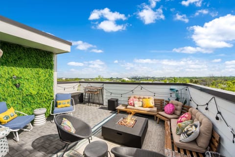 Lounge the day away in style on the spacious rooftop deck!