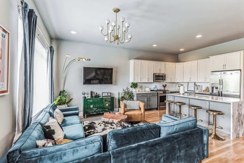 Curl up in the chic living room & stream your favorites on the smart TV