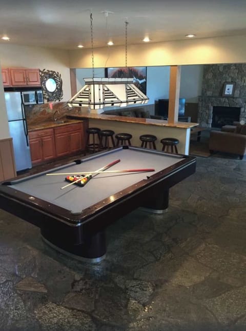 Rec room pool table, fridge, big screen TV, fireplace (ping pong upstairs)