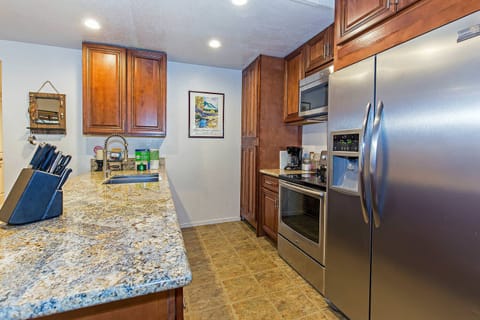 Kitchen w/ drip coffee pot, toaster, blender, slow cooker, wine ware and more