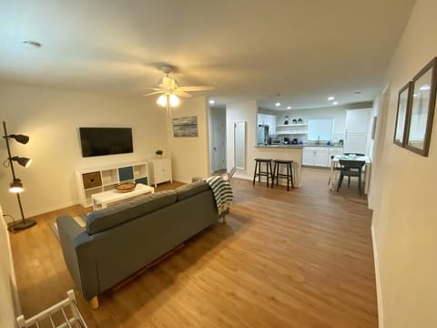 Relax in a stylish space that perfectly blends modern design with beachy vibes.