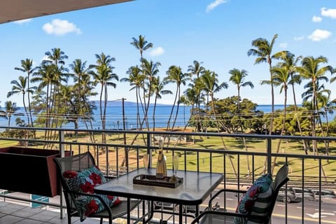 Watch the waves from your private lanai dinging table