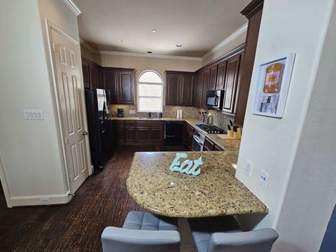 Tiled shower with modern fixtures and spa-like feel.