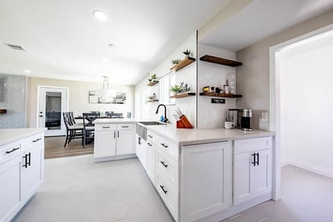 Modern kitchen space, equipped to accommodate your cooking needs.