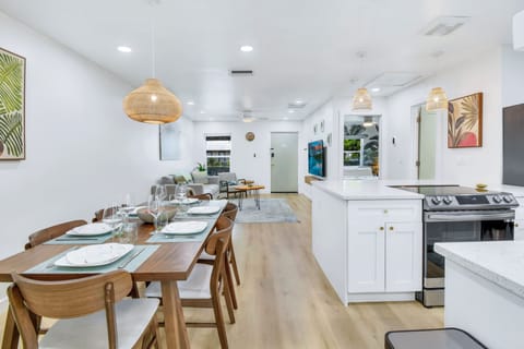 The open concept living room/kitchen lets guests socialize freely. 