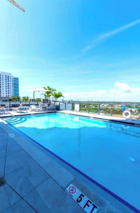 The building's stunning rooftop pool and sun deck.