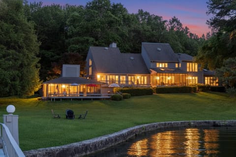 View of the expansive property and yard from the boat dock