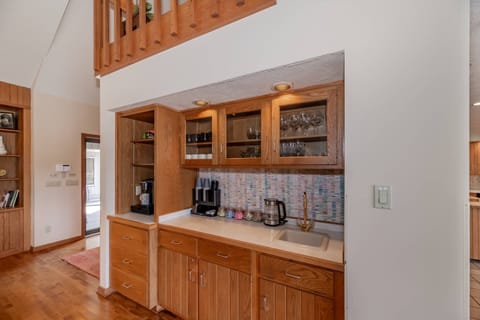 View of the wet bar in the first living space
