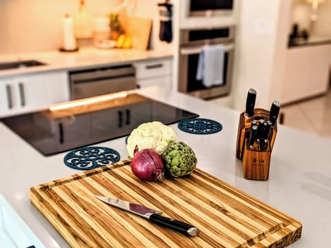 Cook up a storm in our fully equipped kitchen - Located right next to the pool.