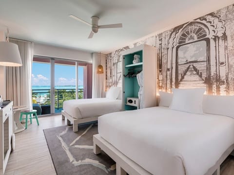 Wake up to ocean breezes from this bright twin bedroom.