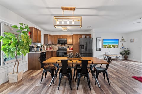 Open kitchen with table and chairs